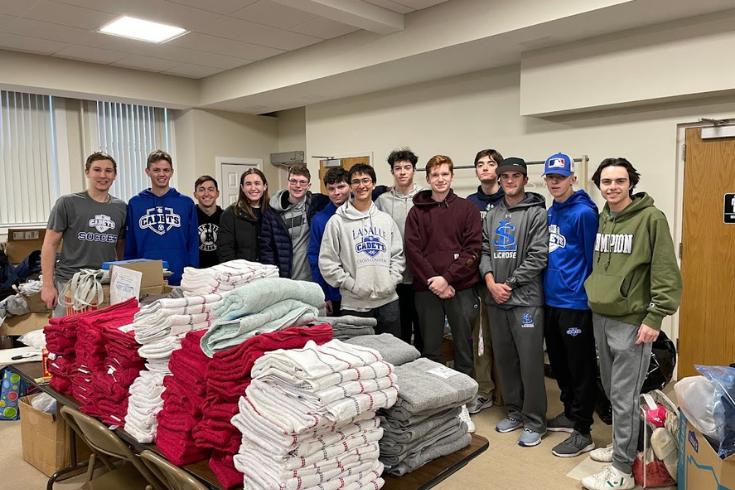 student doing community service